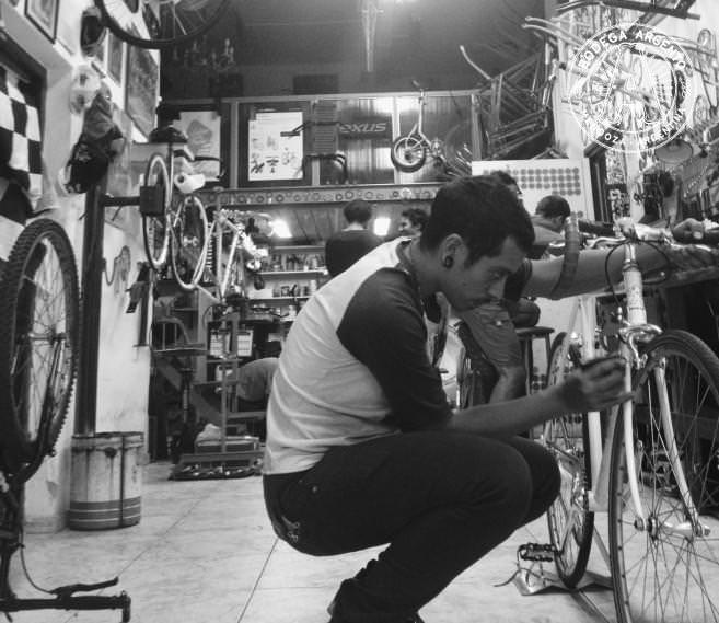 Working on bicycles at Born in Garage